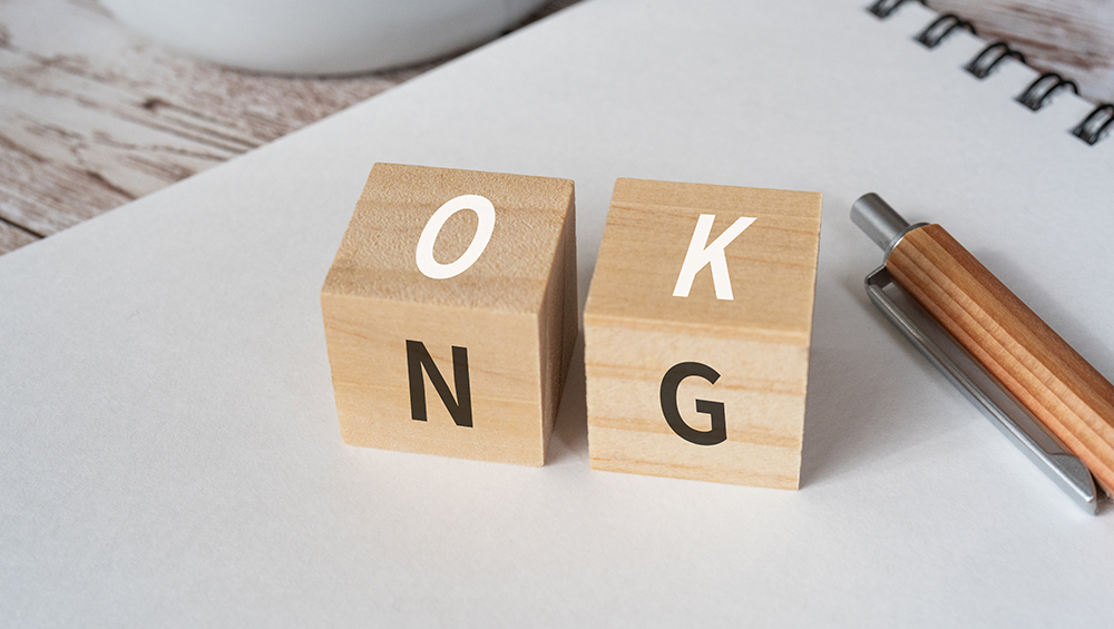 IllustratorデータのOKとNGを表す木製ブロックの写真